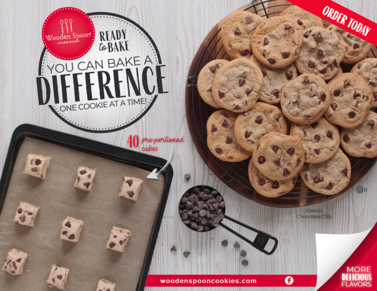 Ready to Bake: You Can Bake a Difference Wooden Spoon cookie dough order form. Cookie dough cubes on tray and baked cookies on wooden plate with wire rack. Chocolate chips in measuring cup.